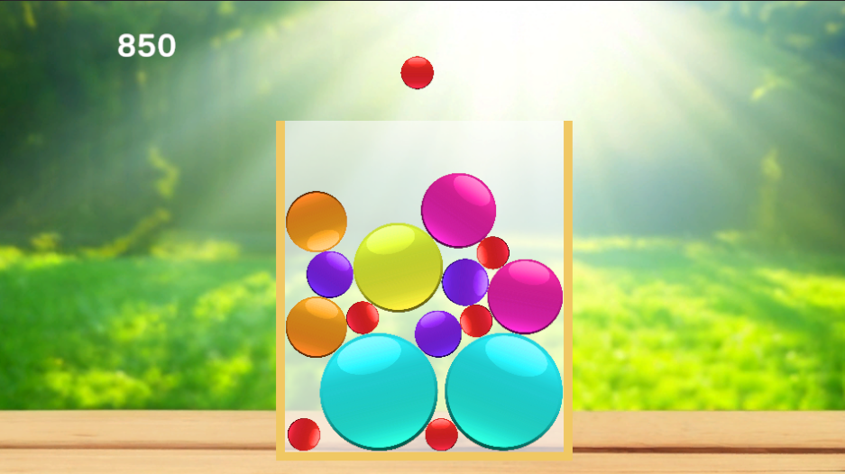大きさの異なるカラーバブルとスコアを表示したMergePuzzleのプレイ画面